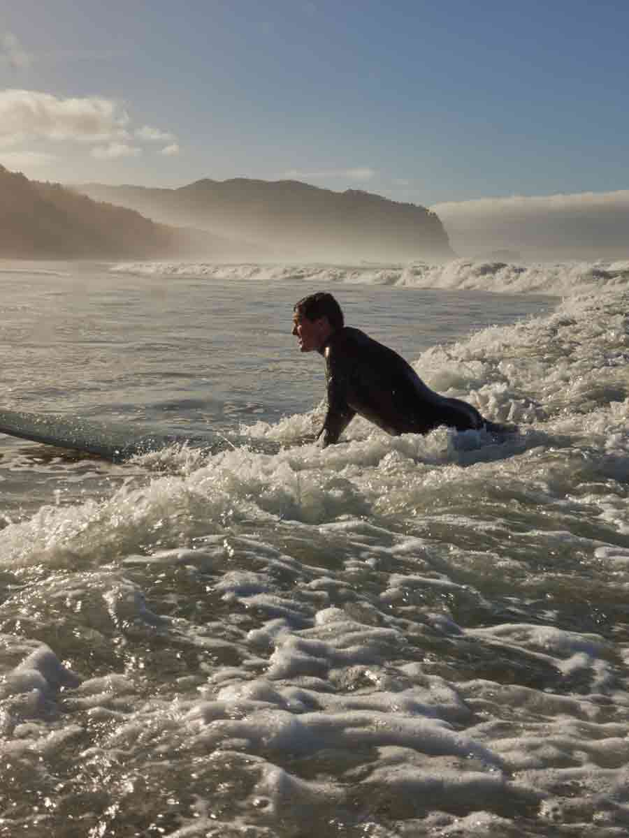 Man on surfboard in sea