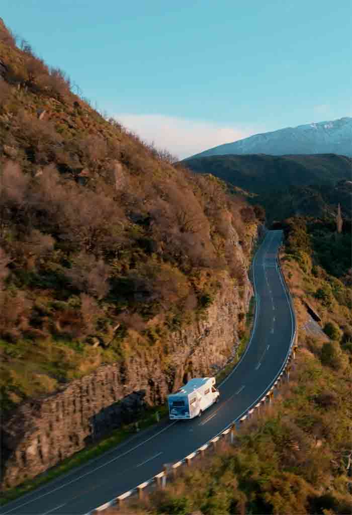 Star RV motorhome on winding mountain road